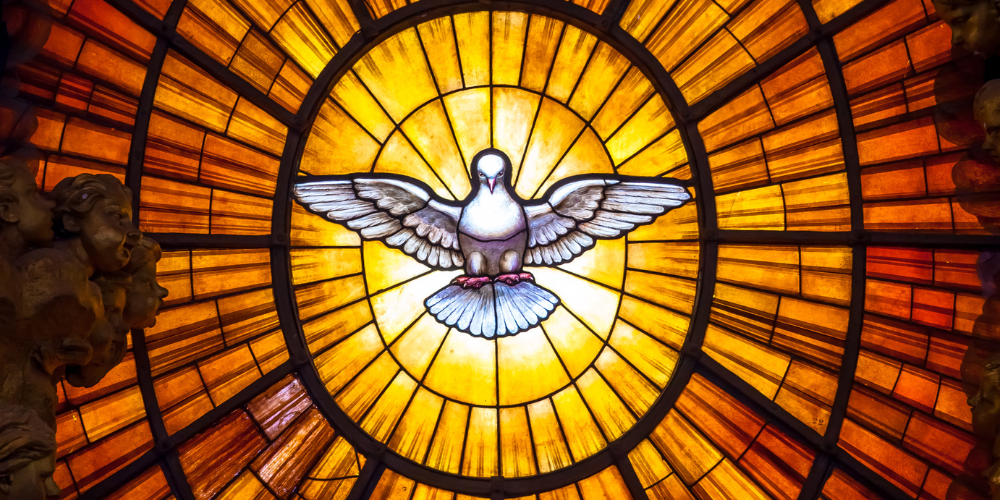 Image of a dove in stain glass