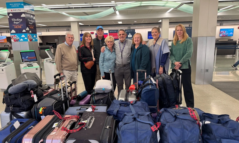 Anne Marie and other members of the trip at the Des Moines aiports