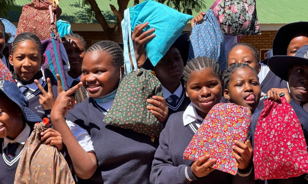 Young girls with their hygiene kits at St. Bede High School