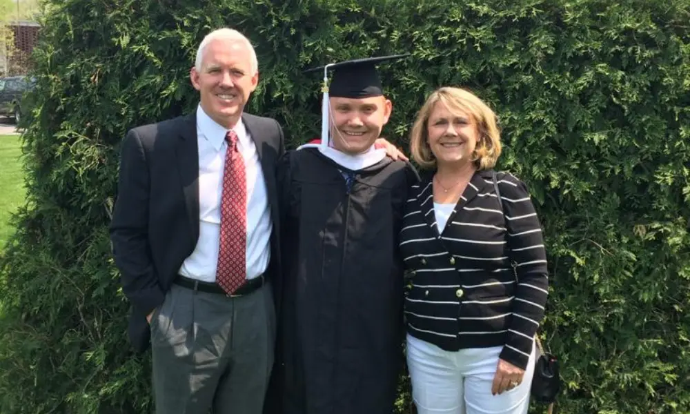 Mike Mahony in after graduation with his parents